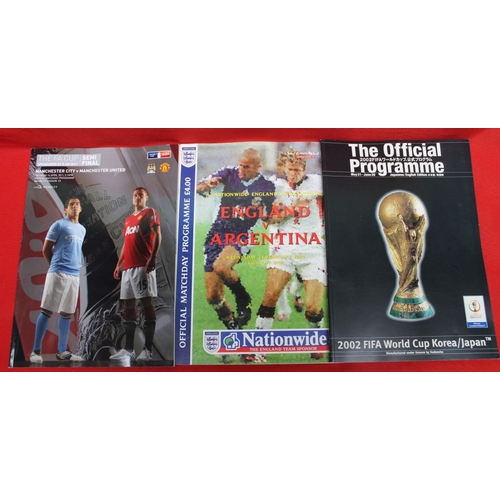 150 - A collection of official football programmes, includes England v Germany FIFA World Cup 2002 Qualifi... 