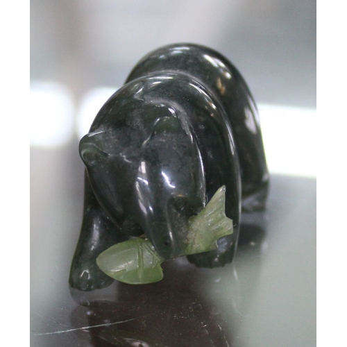 155 - Two Canadian/Inuit Jade carvings, a Totem Pole 5.5cm high and a bear with fish in its mouth 3.5cm lo... 