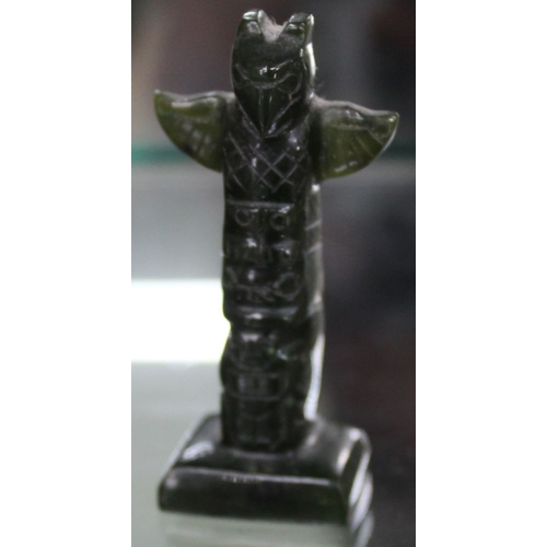 155 - Two Canadian/Inuit Jade carvings, a Totem Pole 5.5cm high and a bear with fish in its mouth 3.5cm lo... 