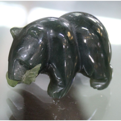 155 - Two Canadian/Inuit Jade carvings, a Totem Pole 5.5cm high and a bear with fish in its mouth 3.5cm lo... 