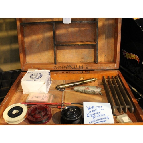 187 - A wooden tackle box containing a boxed Craddock-Astwood Flo 151 fly reel and other accessories