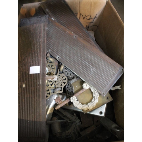 193 - A crate and a box containing a selection of tools, brass wares, door knobs, finger plates etc