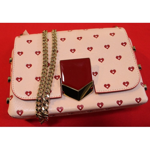 222 - A Jimmy Choo leather sweetheart shoulder bag, pink with heart decoration with chain strap, in cloth ... 