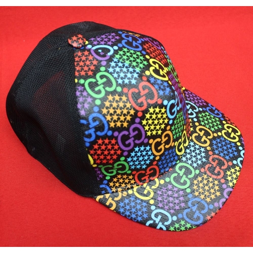 245 - A Gucci baseball cap (large) in Gucci carrier bag