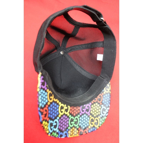 245 - A Gucci baseball cap (large) in Gucci carrier bag