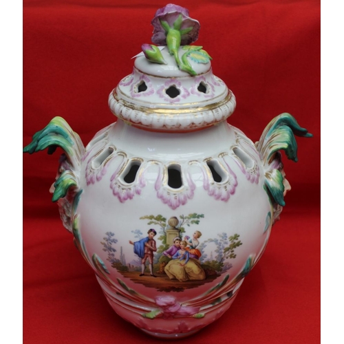 248 - A 19th century Berlin porcelain potpourri, vase form with mask handles, painted in colours with figu... 