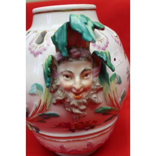 248 - A 19th century Berlin porcelain potpourri, vase form with mask handles, painted in colours with figu... 