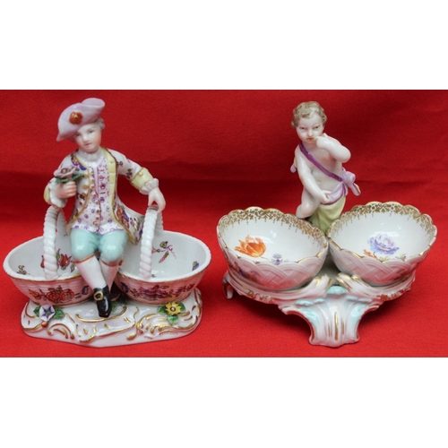 249 - Four 19th century porcelain salts, including a pair of Meissen ones, modelled as figures sat upon ba... 