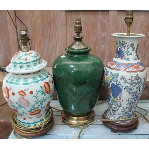 256 - Three late 29th century table lamps of Oriental design, includes a green lamp with malachite glaze