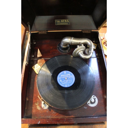 70 - An Alba vintage Mahogany cased wind up gramophone with a selection of 78's