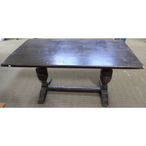 77 - An Elizabethan design oak refectory table, raised on cup & cover trestle ends, 81cm x 152cm