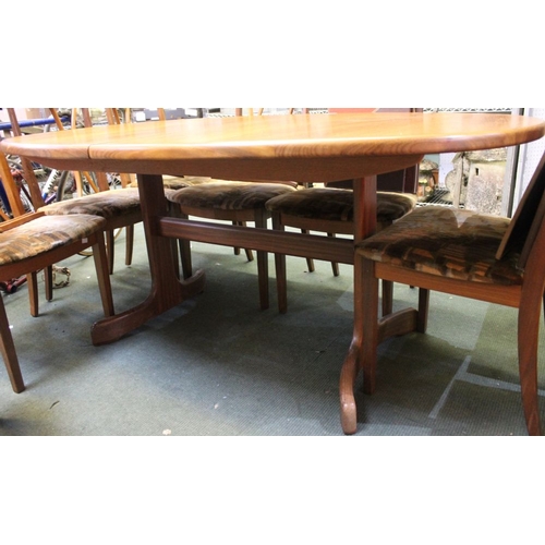 240 - A vintage G-Plan teak oval dining table with adjustable central leaf