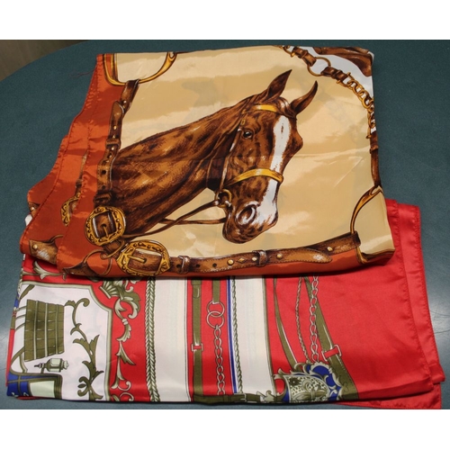 29 - Two Hermes style printed head scarves, one in browns with horse decoration, the other predominantly ... 