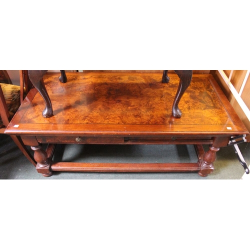 298 - A substantial dark wood coffee table with two drawers