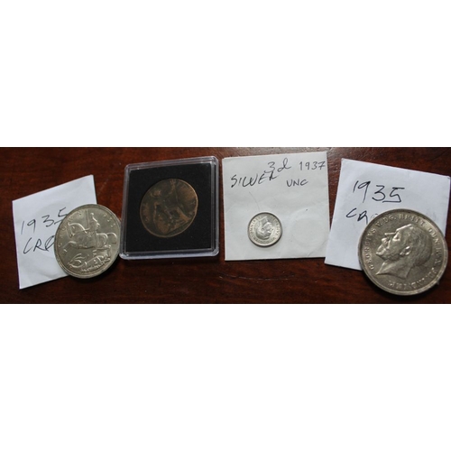 31 - Two 1935 Crowns, an uncirculated 1937 silver 3d coin and a 1917 penny (4)