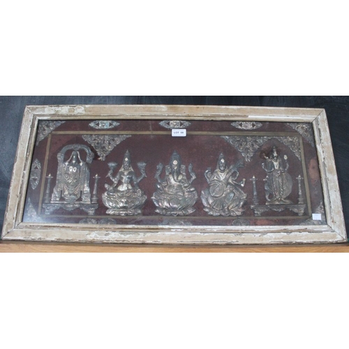 59 - An Indian white metal frieze, depicts Ganesh to the centre, 29cm x 78cm, framed and glazed