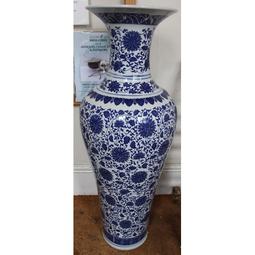 64 - A pair of Chinese glazed earthenware vases of baluster form, decorated in the round with cobalt blue... 