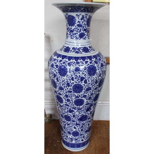 64 - A pair of Chinese glazed earthenware vases of baluster form, decorated in the round with cobalt blue... 