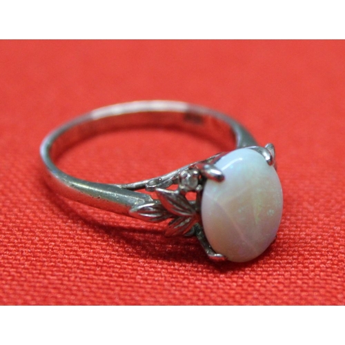 9 - An 18k white gold Opal set ring, gross weight 3g