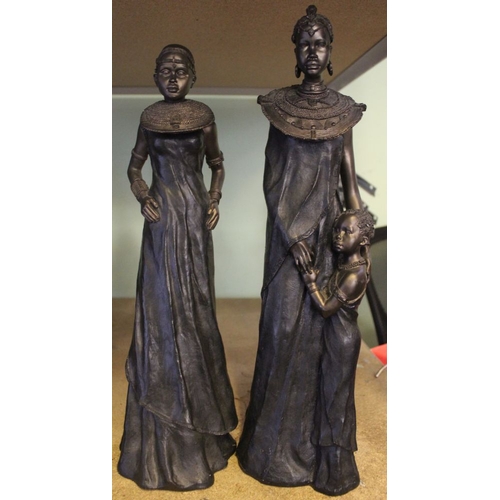 145 - Two Maasai figures of women from the Leonardo Collection, together with another example of a Maasai ... 