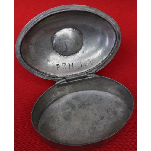 156 - A Liberty and Co oval pewter box with hinged lid, inset cabochon, stamped to base 