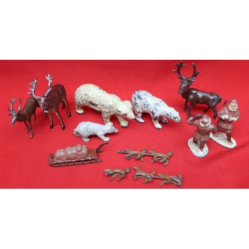 168 - A J Hill and Co painted die cast Polar Bear, other bears, deer, dog sled team and two Inuit