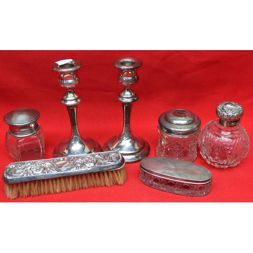 171 - A collection of hallmarked silver items, includes a pair of silver candlesticks, a cut glass grenade... 