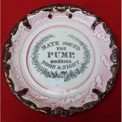 210 - A 19th century lustre ware wall plate, bearing the motto 