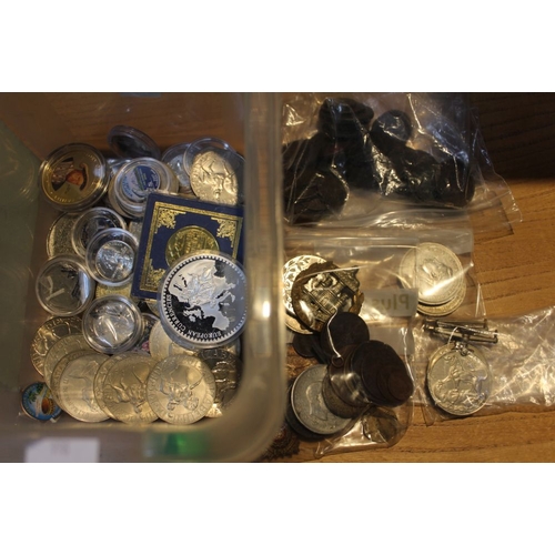 211 - A bag containing old copper coins, commemorative, crowns, badges, tokens & a couple of medals