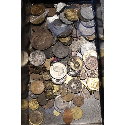 214 - An old tin containing badges, old copper coins & Roman medallions, etc