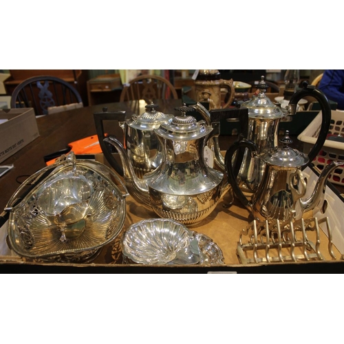 222 - A collection of silver plated items to include bottle-holder, coffee pots, teapots, etc