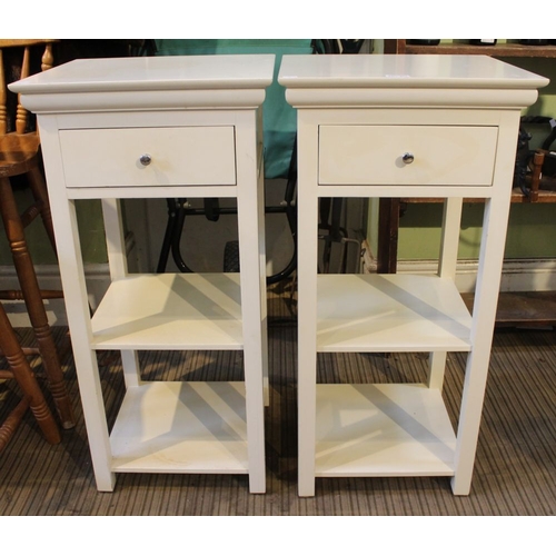 225 - A pair of bedside tables, fitted drawer and under tiers