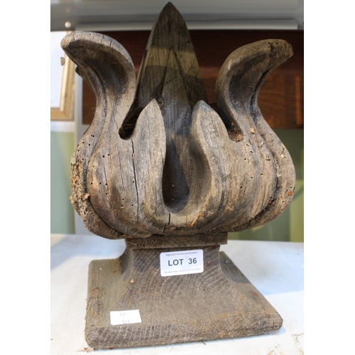 36 - A carved oak flame finial 29cm high