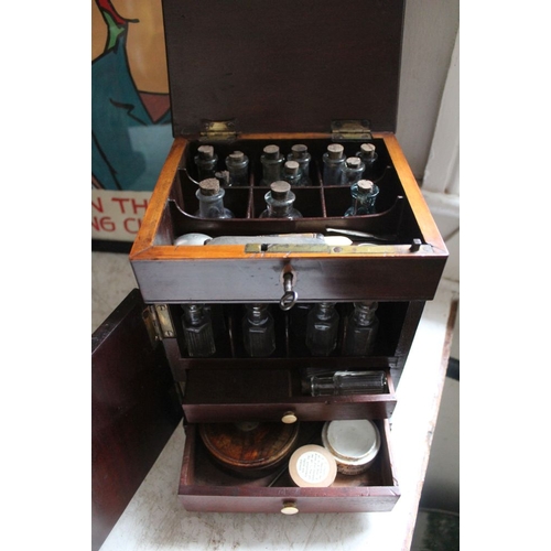 385 - A 19th century mahogany apothecary case with contents