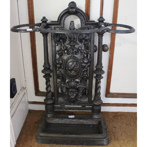 391 - A possible late 19th century cast iron, three hoop stick / umbrella stand with drip tray & pierced b... 