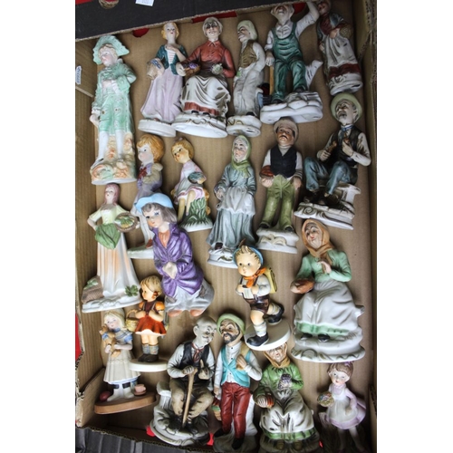 40 - Two Hummell ceramic figurines and a collection of European ceramic figures, includes Capo di Monti