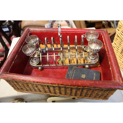 54 - An Edwardian leather lined desk top tray basket, together with box wood rulers, a plated combination... 