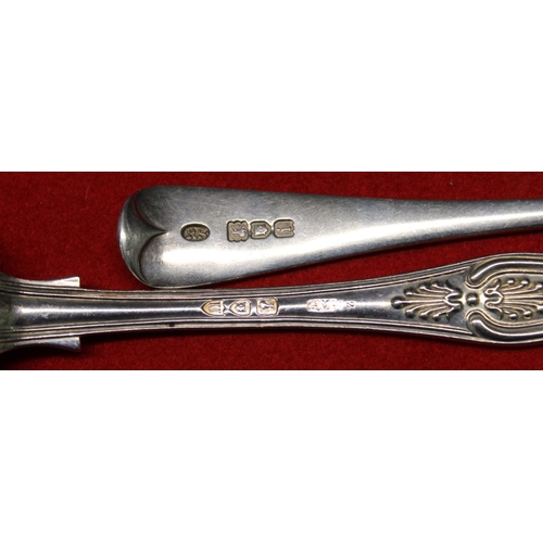 11 - A pair of Edwardian silver dessert spoons, Hanovarian pattern, London 1904 and a pair of Kings patte... 