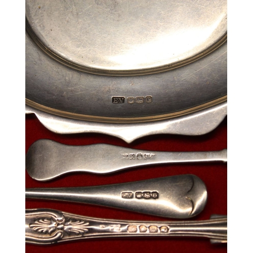 13 - An oval silver dish and three various silver spoons, all hallmarked, combined weight 285g