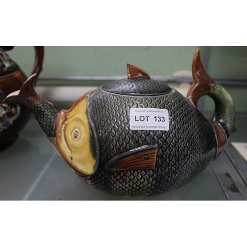 133 - A late 19th century teapot modelled as a fish, consuming a smaller fish