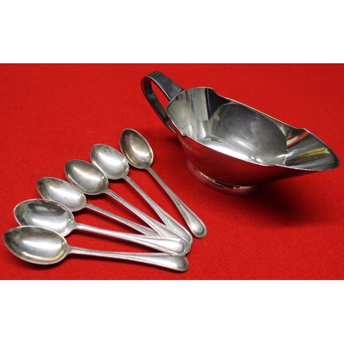 18 - A silver sauce boat and a set of silver coffee spoons, total weight: 189g