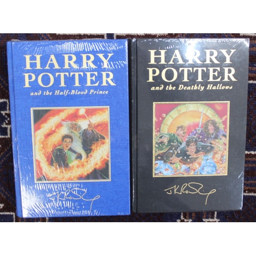 201 - Harry Potter J.K.Rowling A Complete set of the de-luxe editions the 7 volumes are all in shrink wrap... 