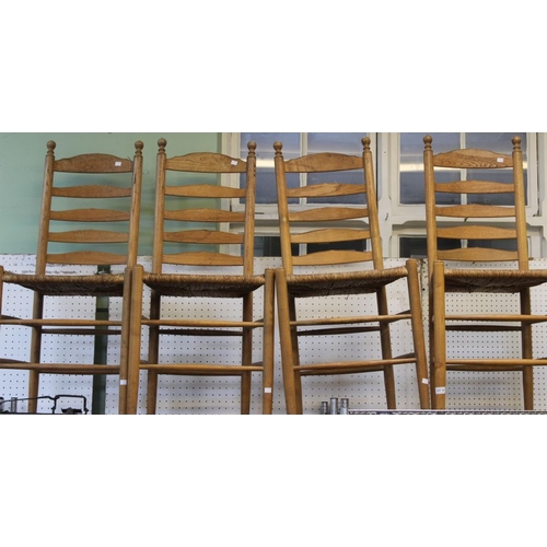 257 - A set of ladder-back rush seat chairs (4)