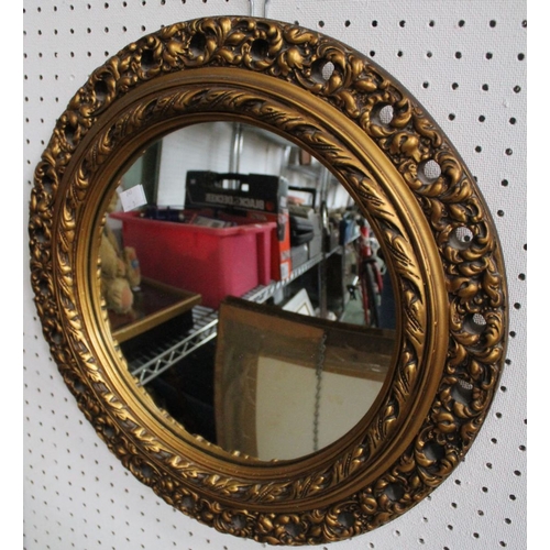 282 - A modern circular wall mirror with gilded frame