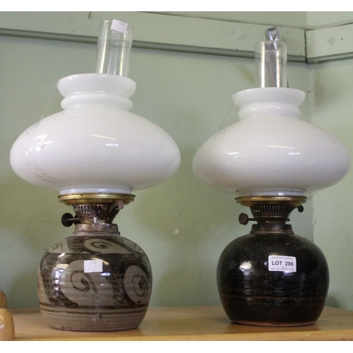 286 - Two Winchcombe pottery lamp bases with glass funnel & shade