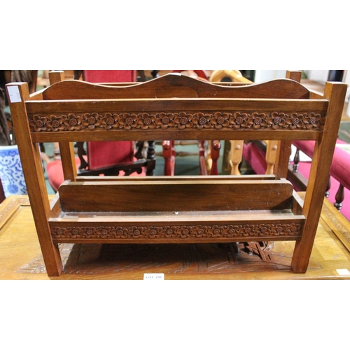 293 - A modern carved wooden magazine rack