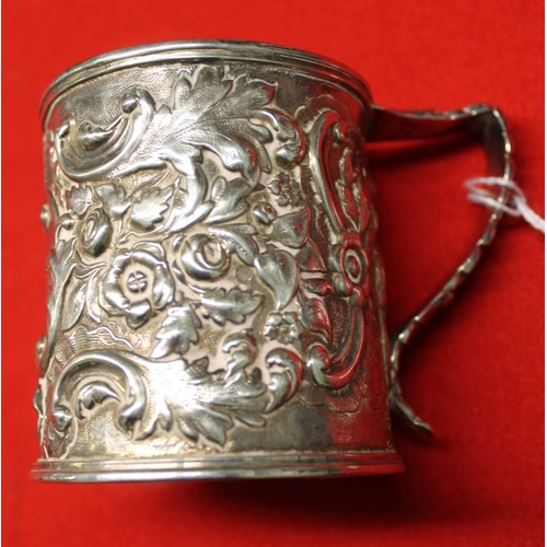 3 - A Victorian silver christening mug, embossed floral decoration, blind cartouche, Sheffield 1853, 126... 