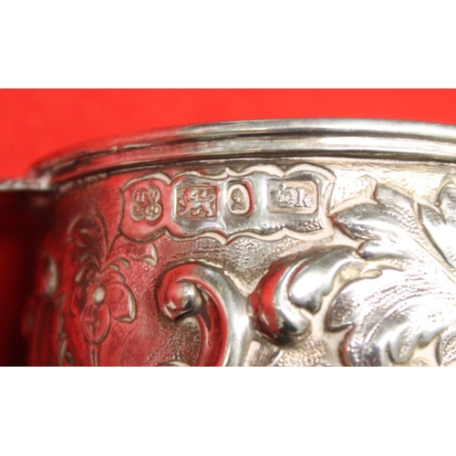 3 - A Victorian silver christening mug, embossed floral decoration, blind cartouche, Sheffield 1853, 126... 