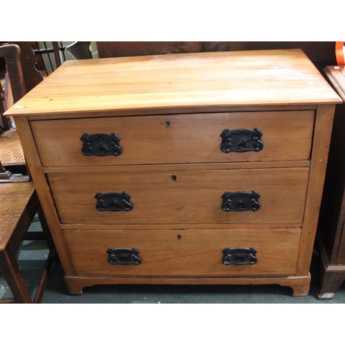 325 - An Edwardian Satinwood chest of three drawers with period handles