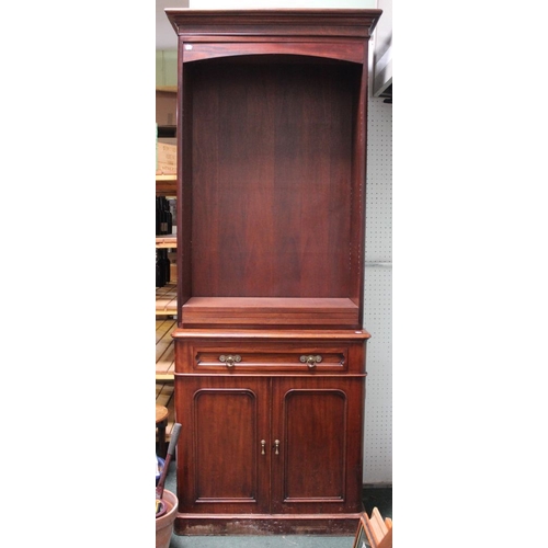 33 - A part 19th century mahogany bookcase on cupboard base with shelves above